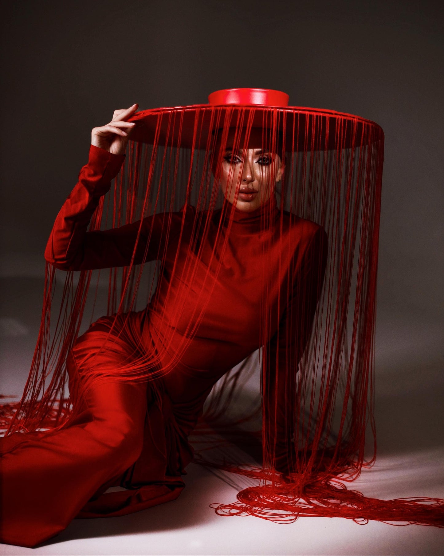 Black or red fringe hat